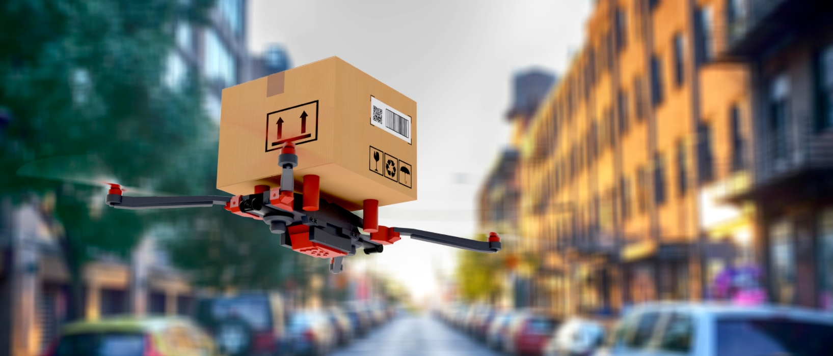 drone carrying parcel through street