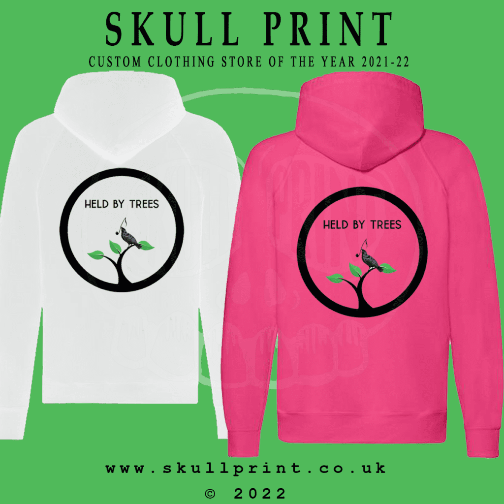 hoodies from behind, one white and one pink, both with held by trees logos on