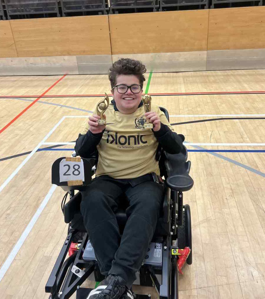 Duchenne UK - Joey, proudly wearing his Ikonic-sponsored Sale Bees kit. Top scorer and league champion in Powerchair Football last season - he doesn’t let anything hold him back.